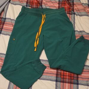 Green Jogger Pants with Orange Accents